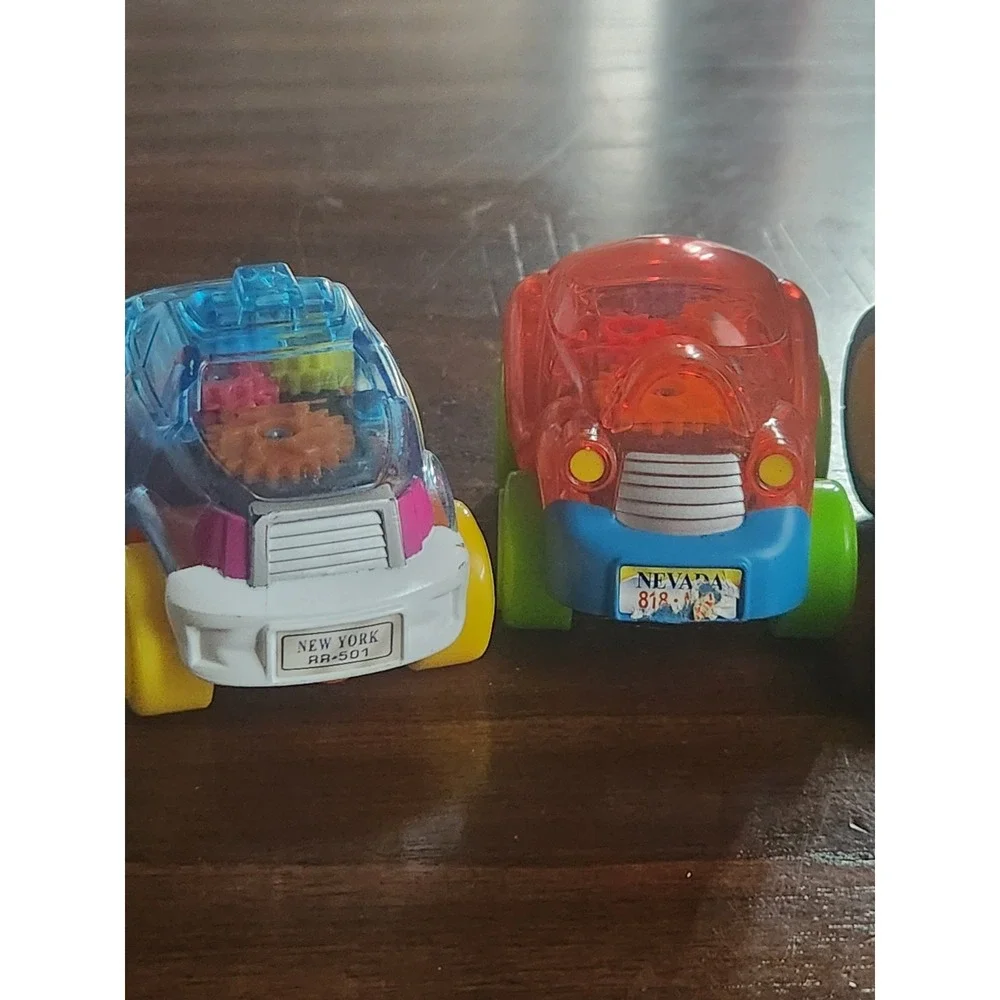 Lot of 4 Vintage toy cars. Pull string Mickey Kart, McDonalds 1993, clear gear